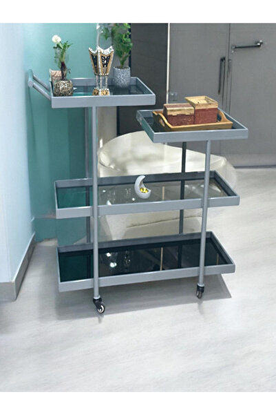 Generic Modern metal service cart with four glass shelves and wheels for easy movement