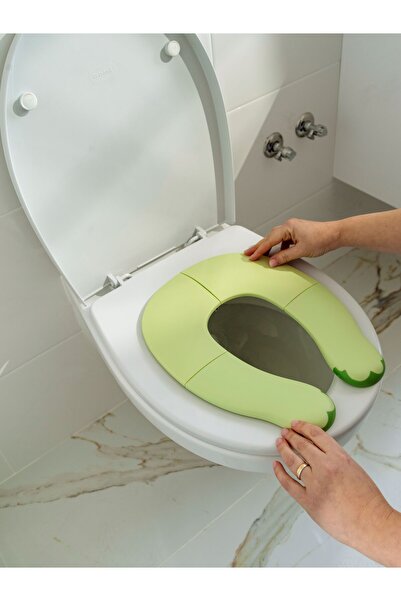 KIDSCENTER Foldable toilet seat reducer for children, includes reusable carrying bag, green