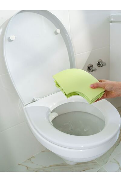 KIDSCENTER Foldable toilet seat reducer for children, includes reusable carrying bag, green