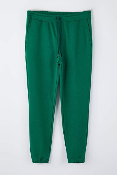 Trendyol Collection Green Regular/Normal Cut Back Pocket Top Label Detail Rubber Leg Track Suit Tmnaw26Ea00012