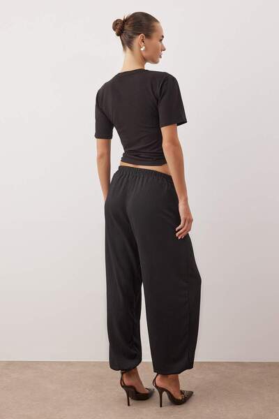Trendyol Collection Black Wrinkled Cuffed Elastic Knitted Baggy Trousers Twoaw26Pl00139