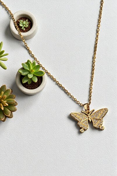 AXXION رمز الحرية: قلادة على شكل فراشة مرصعة بحجر الزركون ذهبي اللون