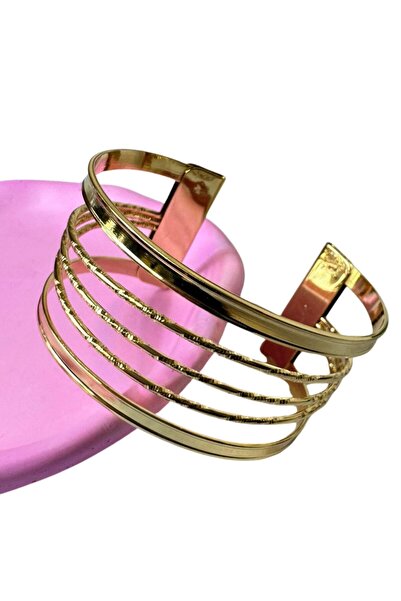 Uretti - ميليك 9215 1182 سوار مجوهرات ذهبية اللون بتصميم شريطي