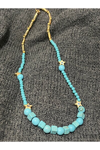 COCOSH TAKI Turquoise natural stone necklace with gold star detail in bohemian design.