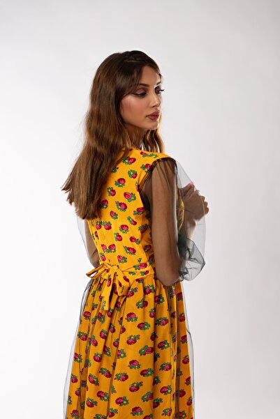 outline Yellow shawl dress with black tulle