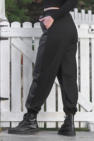 Chiccy Black Pocketed Elasticated and Tied Waist Elasticated Leg Casual Faux Leather Knitted Trousers 96 60