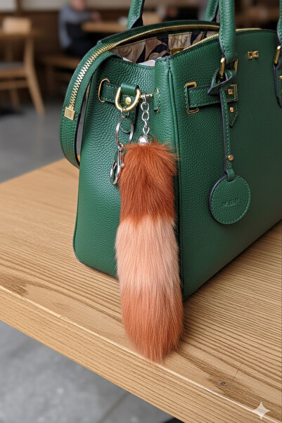 Modex Αξεσουάρ τσάντας με μακρύ φτερό σε ασημί χρώμα (15 εκ.)