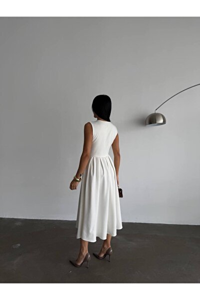 OLSAMODA KADIN ÖNÜ DÜĞME DETAYLI ETEĞİ KLOŞ ATLAS KUMAŞ MİDİ BOY ELBİSE