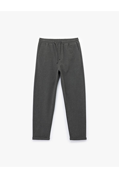 Koton Viskon Karışımlı Cep Detaylı Dokulu Beli Bağcıklı Pantolon