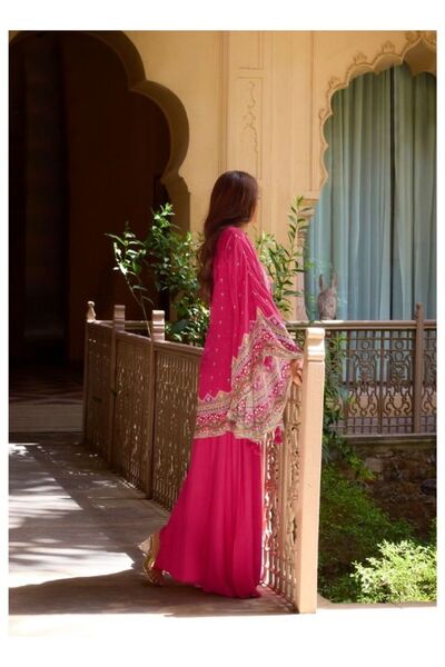 HashtagBe Vibrant Fuchsia Ethnic Wear Against Traditional Indian Architecture