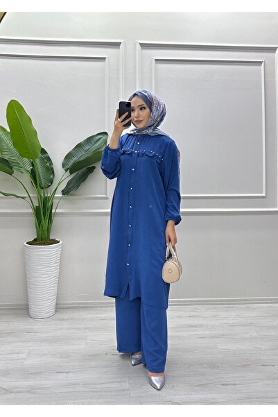 moda acar طقم بتفاصيل حجرية وحواف مكشكشة في الأمام