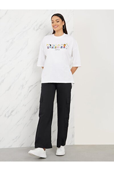 Styli Women Oversized Peanuts Graphic Print Drop Shoulder T-Shirt - White
