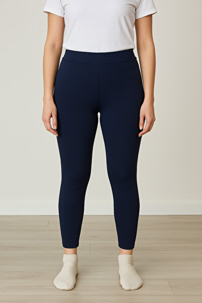 DAİSİES ملابس رياضية مرنة باللون الأزرق الداكن يبرز انحناءات الجسم ذات خصر عالٍ