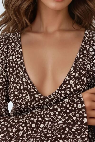 Hiccup Елегантна рокля с V-образно деколте и флорални мотиви