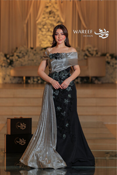WAREEF FASHION Black and light olive dress decorated with embroidery and a side tail