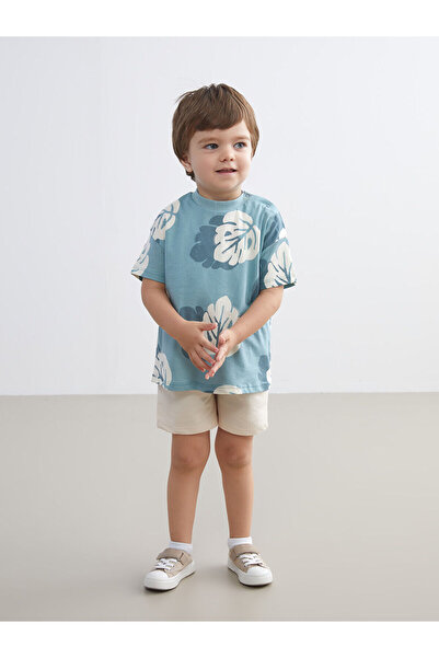 LC Waikiki مجموعة إلسيفا: تي شيرت وشورت أزرق مطبوع للأطفال الأولاد، طقم من قط...