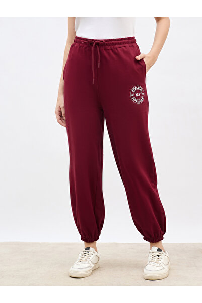 Styli Burgundy Tapered Joggers with Graphic Print