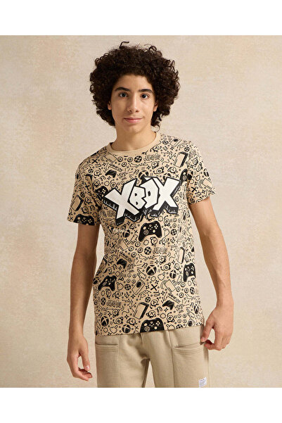 REDTAG تي شيرت مطبوع باللون البيج للأولاد الكبار