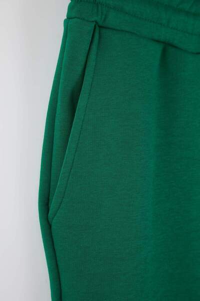 Trendyol Collection Green Regular/Normal Cut Back Pocket Top Label Detail Rubber Leg Track Suit Tmnaw26Ea00012