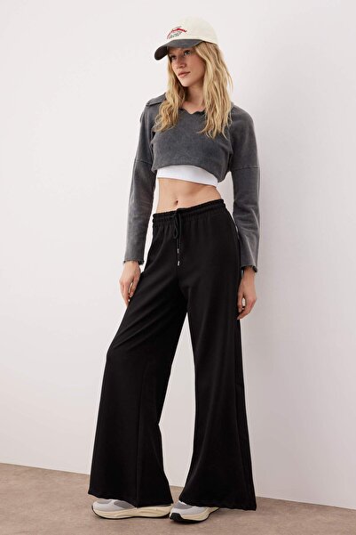 Trendyol Collection Μαύρο βαμβακερό φαρδύ πόδι, λεπτό πλεκτό αθλητικό παντελόνι TWOAW22EA0053
