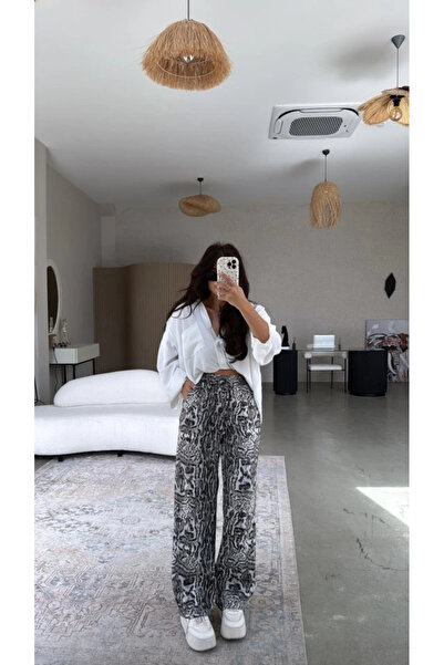 Butik Жіночі сатинові штани з леопардовим принтом