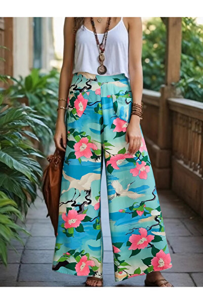 FASHION COCKTAIL Зелені бохо-штани з широкими штанинами та шовковистою фактур...