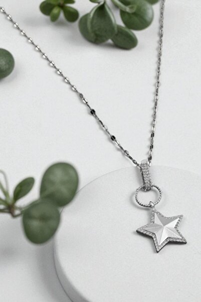 AXXION قلادة نجمة من حجر الزركون - تصميم فولاذي لامع وأنيق