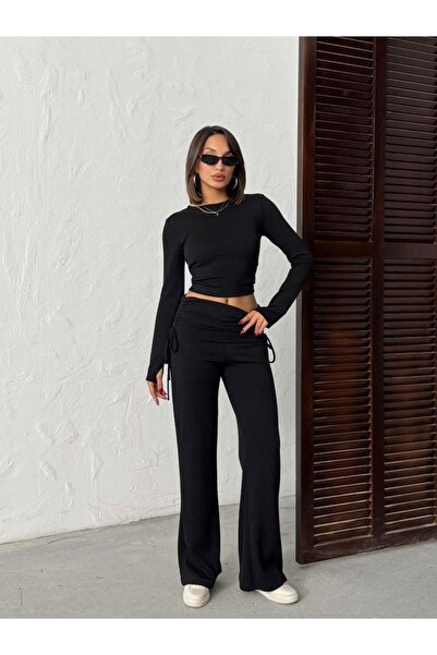 Jeevee Costum cu picioare largi din amestec modal – cu fixare prin degete