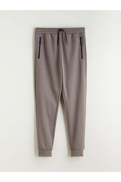 LC Waikiki Ανδρικό παντελόνι Jogger XSIDE ACTIVE Brown Standard Fit