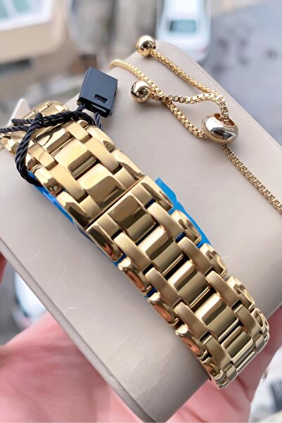 Tom Jones Kadın kolsaati gold orjinal çelik 3 atm su gecirmez 2 yıl garantili bileklik hediyelidir