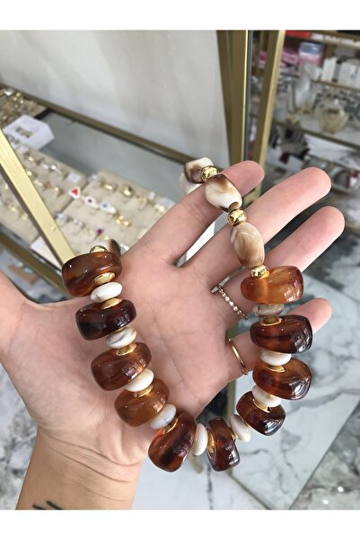 the ASEL İNCİ قلادة كبيرة بنية اللون مزينة بخرز زجاجي وتفاصيل ذهبية