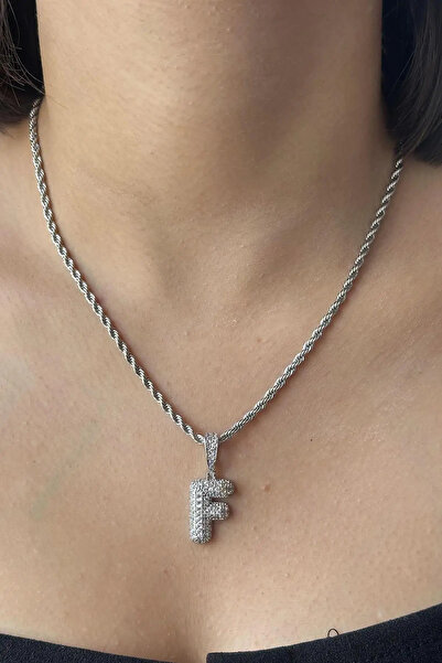 MODA قلادة بحرف F مزينة بحجر فضي اللون