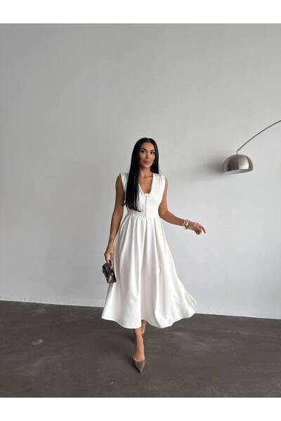 OLSAMODA KADIN ÖNÜ DÜĞME DETAYLI ETEĞİ KLOŞ ATLAS KUMAŞ MİDİ BOY ELBİSE