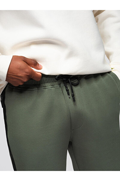 OMBRE Pánské tepláky s rovnými nohavicemi a elastickými detaily - tmavě olivové V4 OM-PASK-0281