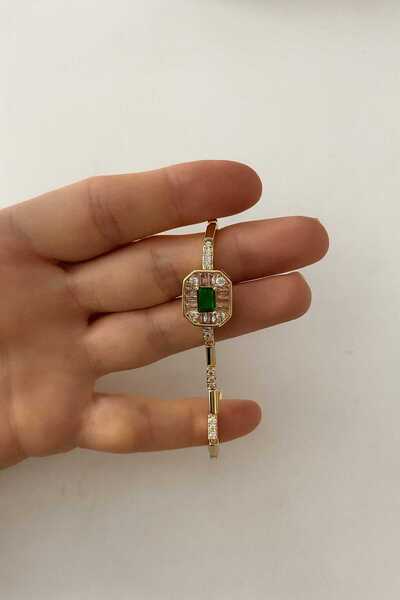 bahia butik aksesuar سوار نسائي ذهبي فاخر بتصميم حجر الزمرد مع أحجار الزركون