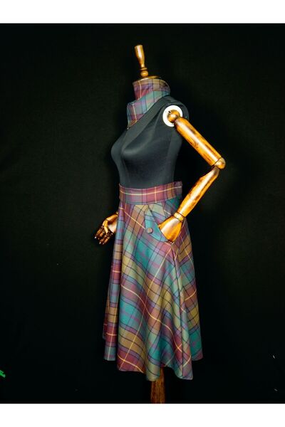 Sihirli Düğmeler تنورة خمر