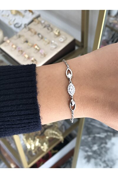 the ASEL İNCİ سوار فضي بتصميم قطرة مع تفاصيل حجرية (لا يتأكسد)
