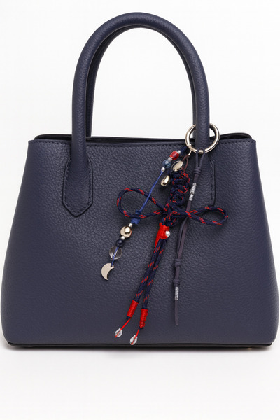 She Sells تعليقة حقيبة عصرية بتصميم خاص مع فيونكة من حبل الباراكورد والجلد ال...