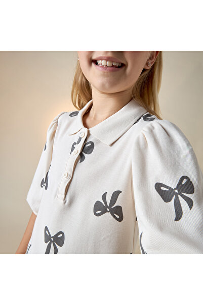 Juniors All-Over Bow Print Polo Dress with Short Puff Sleeves and Button Closure
