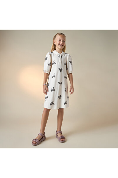 Juniors All-Over Bow Print Polo Dress with Short Puff Sleeves and Button Closure