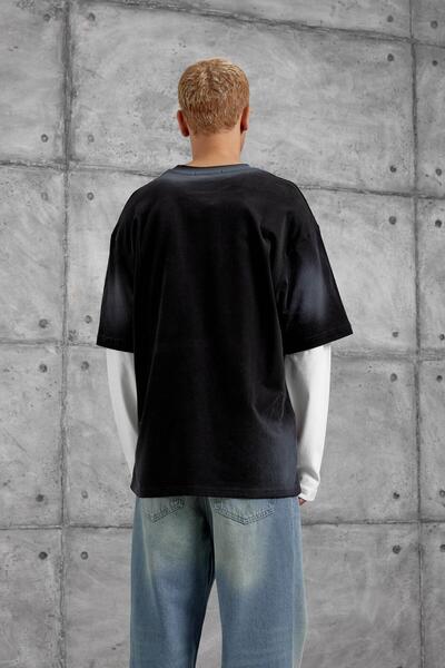 NOMARC Μαύρο φούτερ με μανίκια Sebizegva με τύπωμα τεμαχίων