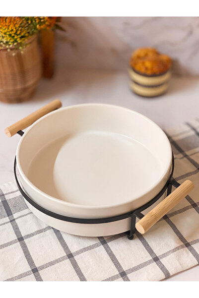 package home A luxurious serving tray made of porcelain with a wooden handle.