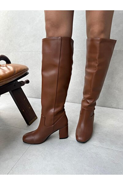 Elvinin Tarzı ليندا (تَابَن) مُزَرَّعَة