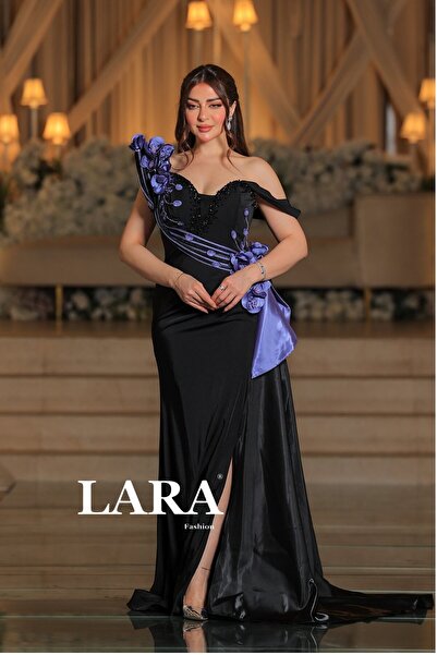 Lara A luxurious black evening dress with an asymmetrical design that highlig...