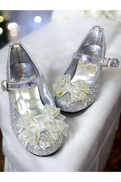 PATİK BEBE KIZ ÇOCUK MİNİK TOPUKLU GÜMÜŞ RENK SÜSLÜ FİYONKLU ŞIK TOPUKLU AYAKKABI