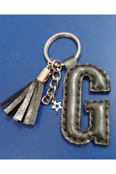 Durush Collection سلسلة مفاتيح من الجلد الطبيعي باللون الرمادي المعدني على شك...