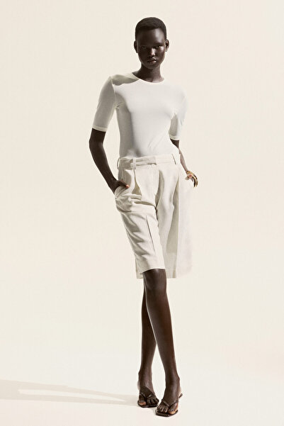 H&M Bedene Oturan Tişört