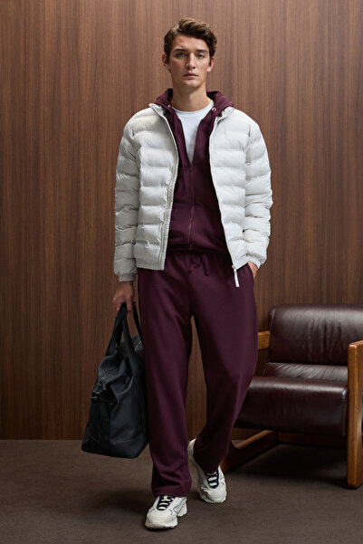 GRIMELANGE Griffin Men's Burgundy Sweatpants with Elastic Waistband and Metal Bird's Eye Detail