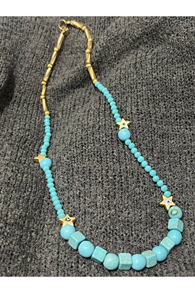 COCOSH TAKI Turquoise natural stone necklace with gold star detail in bohemian design.