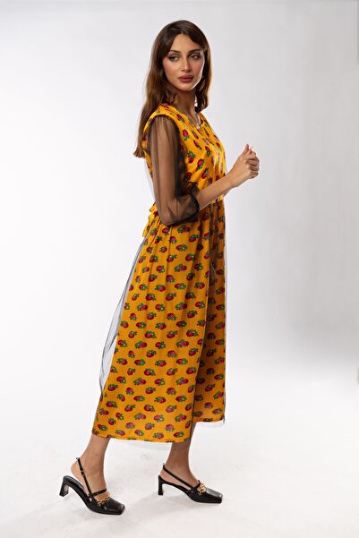outline Yellow shawl dress with black tulle